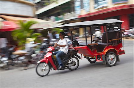 road motion - Tuk-tuk driver, Phnom Penh, Cambodia, Indochina, Southeast Asia, Asia Photographie de stock - Rights-Managed, Code: 841-06501946