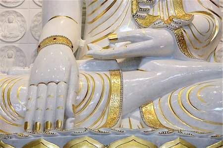 Detail of Buddha sitting in bhumisparsha-mudra posture (calling the earth to witness), Fo Guang Shan Temple, the largest Buddhist temple in Europe, Bussy-Saint-Georges, Seine-et-Marne, France, Europe Photographie de stock - Rights-Managed, Code: 841-06502105