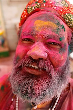 painted faces - Holi celebration in Goverdan, Uttar Pradesh, India, Asia Stock Photo - Rights-Managed, Code: 841-06502154