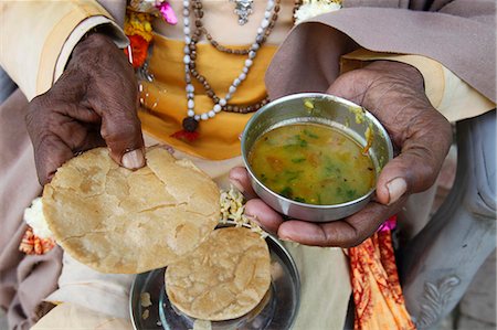 Sadhu eating vegetarian food, Dauji, Uttar Pradesh, India, Asia Stock Photo - Rights-Managed, Code: 841-06502175