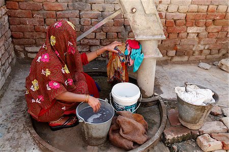 sari full shot for women - Woman doing laundry, Mathura, Uttar Pradesh, India, Asia Stock Photo - Rights-Managed, Code: 841-06502211