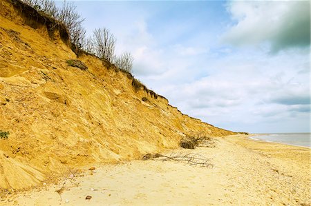 suffolk - Severe erosion of loose Quaternary glacial sands on this coast that has retreated more than 500m since the1830s, Covehithe, Suffolk, England, United Kingdom, Europe Stock Photo - Rights-Managed, Code: 841-06502642