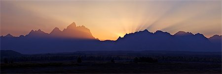 Panoramic photo of sunset over the Cathedral Group of mountains, Grand Teton National Park, Wyoming, United States of America, North America Stock Photo - Rights-Managed, Code: 841-06502727