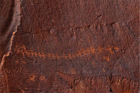 pictograph - Paper doll cutouts, Formative Period Petroglyphs, Utah Scenic Byway 279, Potash Road, Rock Art Sites, Moab, Utah, United States of America, North America Stock Photo - Rights-Managed, Code: 841-06502747