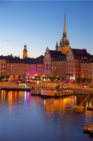 Gamla Stan and Riddarholmen with spire of Riddarholmskyrkan (Riddarholmen Church) at dusk, Stockholm, Sweden, Scandinavia, Europe Stock Photo - Rights-Managed, Code: 841-06502886