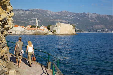 simsearch:841-06502954,k - Couple walking along coast towards Old Town, Budva, Montenegro, Europe Stock Photo - Rights-Managed, Code: 841-06502937