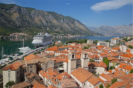 View over Old Town, UNESCO World Heritage Site, with cruise ship in port, Kotor, Montenegro, Europe Stock Photo - Rights-Managed, Code: 841-06502979