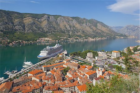 View over Old Town and cruise ship in Port, Kotor, UNESCO World Heritage Site, Montenegro, Europe Stock Photo - Rights-Managed, Code: 841-06502997