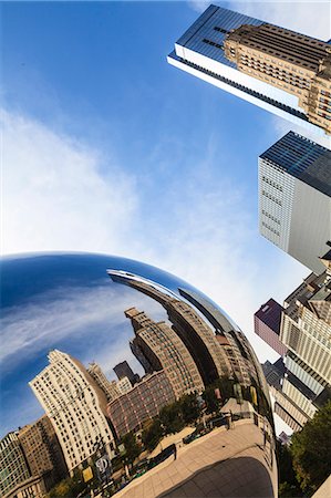 Tall buildings on North Michigan Avenue reflecting in the Cloud Gate steel sculpture by Anish Kapoor, Millennium Park, Chicago, Illinois, United States of America, North America Stock Photo - Rights-Managed, Code: 841-06616710