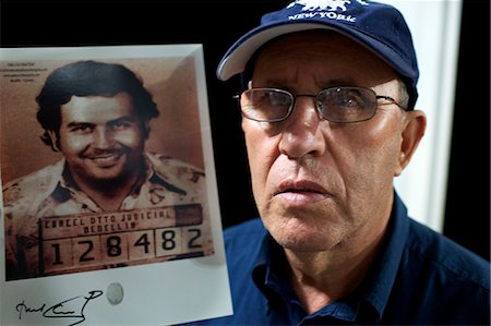 Roberto Escobar with a picture of his brother Pablo, Medellin, Colombia, South America Stock Photo - Rights-Managed, Code: 841-06616737