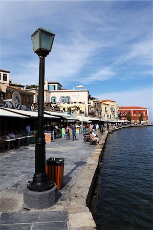 Bars and restaurants around the Venetian harbour of the Mediterranean port of Chania (Canea), Crete, Greek Islands, Greece, Europe Fotografie stock - Rights-Managed, Codice: 841-06616824