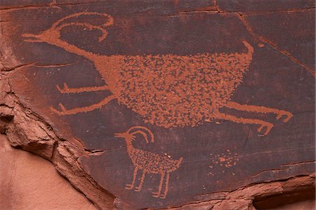 Bighorn Sheep at the Sun's Eye. Anasazi Petroglyphs, Monument Valley Navajo Tribal Park, Utah, United States of America, North America Photographie de stock - Rights-Managed, Code: 841-06616853