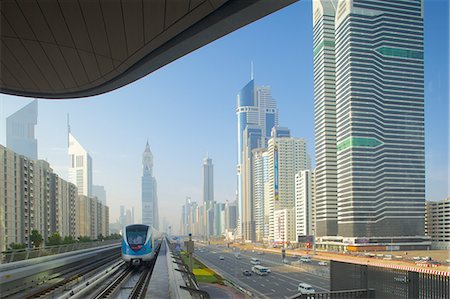 passenger train - Metro and skyscrapers on Sheikh Zayed Road, Dubai, United Arab Emirates, Middle East Stock Photo - Rights-Managed, Code: 841-06616881