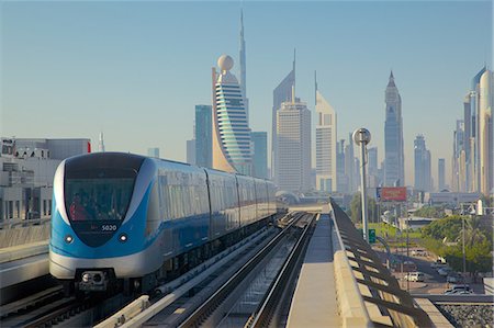 Metro and skyscrapers on skyline, Dubai, United Arab Emirates, Middle East Fotografie stock - Rights-Managed, Codice: 841-06616905