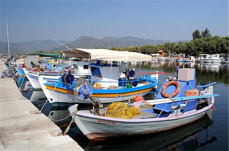 Traditional wooden fishing boats moored in Skala Kalloni harbour, Lesbos (Lesvos), Greek Islands, Greece, Europe Stock Photo - Rights-Managed, Code: 841-06617178