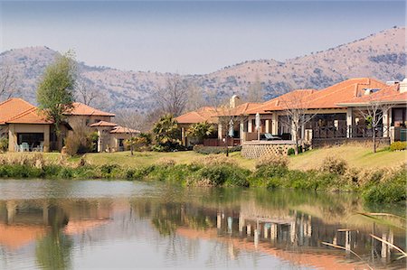 simsearch:841-03673607,k - The view across the lake in Pecanwood Estate, an affluent gated community in Hartbeespoort, North West Province, South Africa, Africa Stock Photo - Rights-Managed, Code: 841-06804384