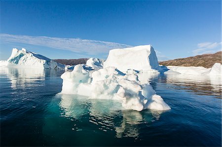 sea ice - Grounded icebergs, Rode O (Red Island), Scoresbysund, Northeast Greenland, Polar Regions Stock Photo - Rights-Managed, Code: 841-06804888