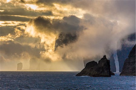 sunny ocean sky - Mykines coastline at sunrise, Faroes, Denmark, Europe Stock Photo - Rights-Managed, Code: 841-06805094
