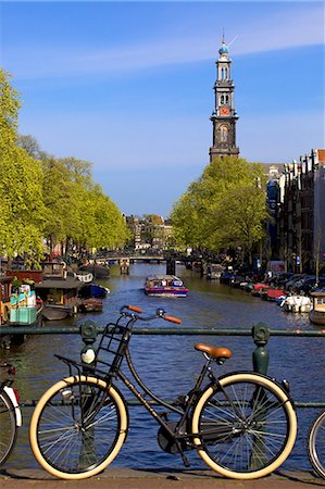 Westerkerk Tower and Prinsengracht Canal with bicycle, Amsterdam, Netherlands, Europe Stock Photo - Rights-Managed, Code: 841-06805332