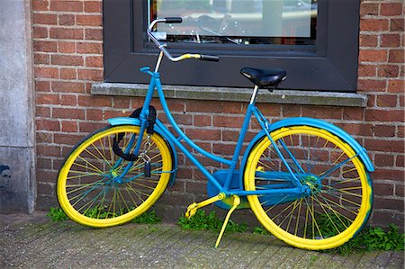 Blue and yellow bicycle, Amsterdam, Netherlands, Europe Stock Photo - Rights-Managed, Code: 841-06805344