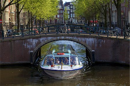 Tourist boat on Keizersgracht, Amsterdam, Netherlands, Europe Photographie de stock - Rights-Managed, Code: 841-06805357