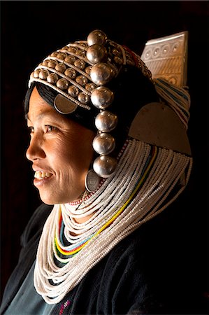 shan state - Woman of the Akha tribe in traditional dress including a headdress of heavy silver baubles, in a hill village near Kengtung (Kyaingtong), Shan State, Myanmar (Burma), Asia Stock Photo - Rights-Managed, Code: 841-06805759