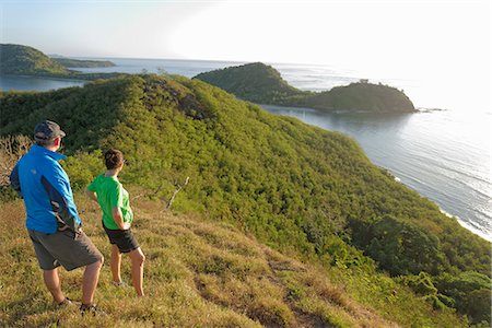 Couple viewing island beauty from the top, Drawaqa Island, Yasawa island group, Fiji, South Pacific islands, Pacific Photographie de stock - Rights-Managed, Code: 841-06805846