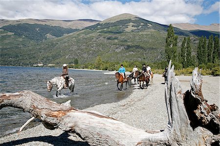 Horseback riding by Guttierez Lake in Estancia Peuma Hue, Patagonia, Argentina, South America Photographie de stock - Rights-Managed, Code: 841-06806252