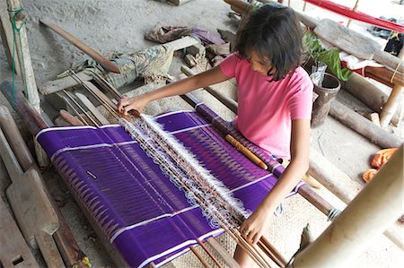 sarong - Young Batak tribeswoman weaving sarong with traditional Batak Toba design, Buhit, Samosir Island, Lake Toba, Sumatra, Indonesia, Southeast Asia, Asia Stock Photo - Rights-Managed, Code: 841-06806947