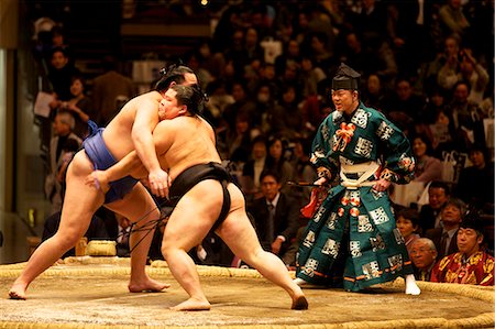 referee - Two sumo wrestlers fighting at the Kokugikan stadium, Tokyo, Japan, Asia Stock Photo - Rights-Managed, Code: 841-06807091