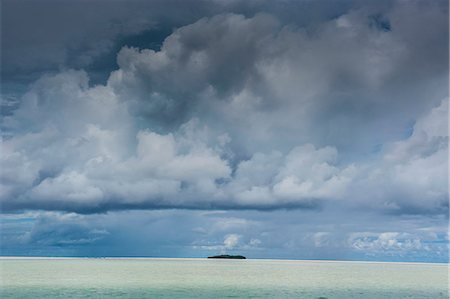 rock islands - Dramatic sky over a little island in the Rock islands, Palau, Central Pacific, Pacific Photographie de stock - Rights-Managed, Code: 841-06807216