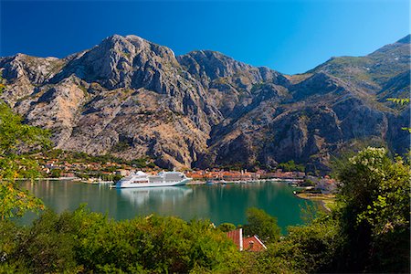 Cruise ship dwarfs the Old Town (Stari Grad), Kotor, Bay of Kotor, UNESCO World Heritage Site, Montenegro, Europe Stock Photo - Rights-Managed, Code: 841-06807416