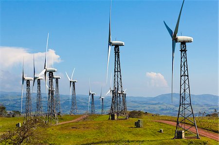 energia eolica - Some of the 55 20MW turbines at the Tilaran wind power farm in hills west of Arenal, Tilaran, Guanacaste Province, Costa Rica, Central America Fotografie stock - Rights-Managed, Codice: 841-06807428