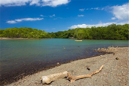 View across the Nosara River mouth towards the Biological Reserve, Nosara, Nicoya Peninsula, Guanacaste Province, Costa Rica, Central America Foto de stock - Con derechos protegidos, Código: 841-06807463