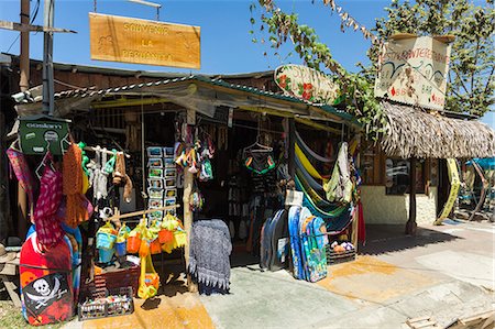 souvenir - Tourist goods shop in the centre of this laid-back village & resort, Samara, Guanacaste Province, Nicoya Peninsula, Costa Rica, Central America Stock Photo - Rights-Managed, Code: 841-06807491