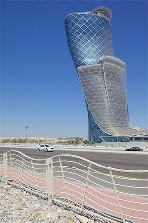 Hyatt Capital Gate Hotel near Abu Dhabi Exhibition Centre from Aloft Hotel, Abu Dhabi, United Arab Emirates, Middle East Stock Photo - Rights-Managed, Code: 841-07084005