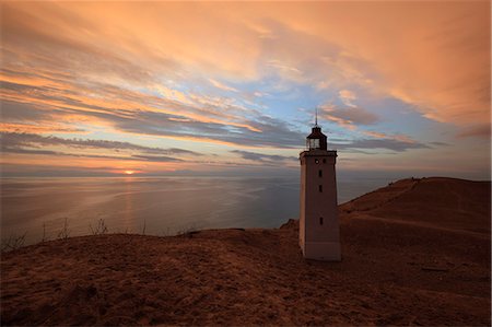 Rubjerg Knude Fyr (lighthouse) buried by sand drift at sunset, Lokken, Jutland, Denmark, Scandinavia, Europe Stock Photo - Rights-Managed, Code: 841-07084103