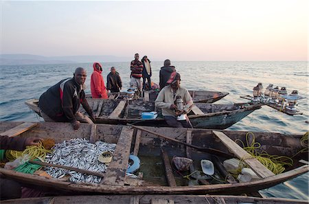 Fishermen on Lake Tanganyika early morning fishing for cichlids to sell in the local fish market, Zambia, Africa Stock Photo - Rights-Managed, Code: 841-07084354