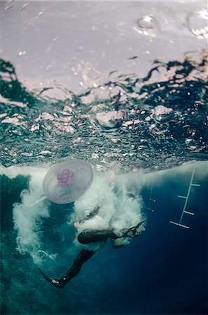 scuba dive in red sea - Underwater view of a scuba diver entering the water, Ras Mohammed National Park, Red Sea, Egypt, North Africa, Africa Stock Photo - Rights-Managed, Code: 841-07084391