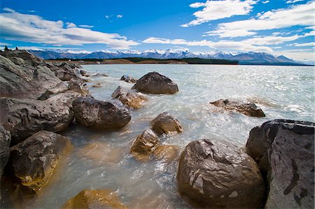 Lake Pukaki and snow capped mountains, Aoraki Mount Cook National Park, UNESCO World Heritage Site, Mackenzie District, South Island, New Zealand, Pacific Stock Photo - Rights-Managed, Code: 841-07080569