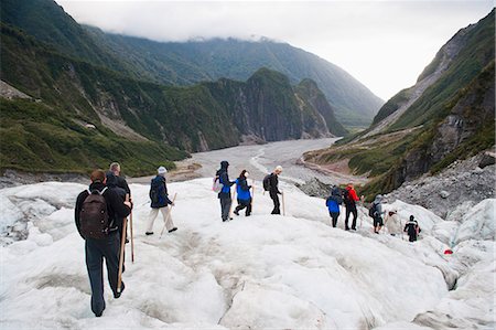 following people - Tourists walking on Fox Glacier, Westland National Park, UNESCO World Heritage Site, South Island, New Zealand, Pacific Stock Photo - Rights-Managed, Code: 841-07080604