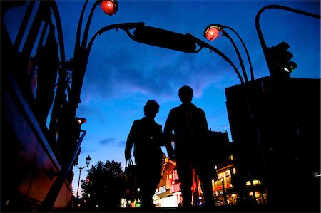 silhouette (darkened or blurred object or figure) - Metro entrance, Montmartre, with Moulin Rouge in the background, Paris, France, Europe Stock Photo - Rights-Managed, Code: 841-07081188
