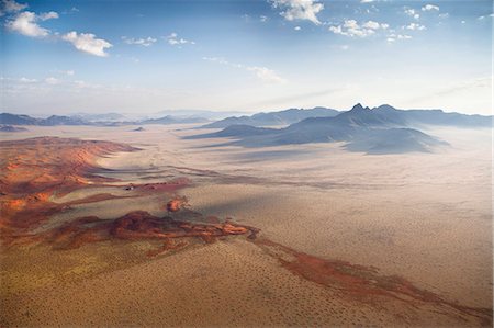 desert cloudy - Aerial view from hot air balloon over magnificent desert landscape of sand dunes, mountains and Fairy Circles, Namib Rand game reserve Namib Naukluft Park, Namibia, Africa Foto de stock - Con derechos protegidos, Código: 841-07081745