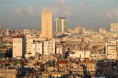 View over Havana Centro showing the city's dilapidated buildings, from the 9th floor restaurant of Hotel Seville, Havana Centro, Cuba Stock Photo - Rights-Managed, Code: 841-07081796