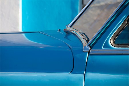 simsearch:841-07081828,k - Detail of vintage blue American car against painted blue wall, Cienfuegos, Cuba, West Indies, Central America Stock Photo - Rights-Managed, Code: 841-07081827