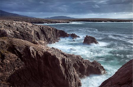 Rugged coastline being pounded by waves on the West coast of Lewis near Mangersta, Isle of Lewis, Outer Hebrides, Scotland, United Kingdom, Europe Foto de stock - Con derechos protegidos, Código: 841-07081843