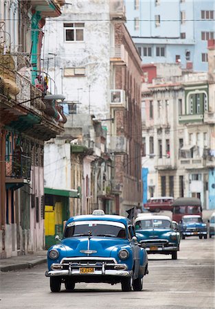 simsearch:841-07081828,k - Vintage American cars used as local taxis, driving down Avenue Colon during afternoon rush hour, Havana Centro, Havana, Cuba, West Indies, Central America Stock Photo - Rights-Managed, Code: 841-07081883