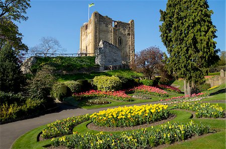 park in small town - Spring flowers in ornamental beds decorate Guildford Castle, Guildford, Surrey, England, United Kingdom, Europe Stock Photo - Rights-Managed, Code: 841-07081898