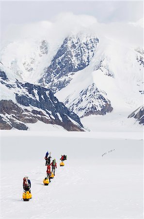 Climbing expedition leaving base camp on Mount McKinley, 6194m, Denali National Park, Alaska, United States of America, North America Stock Photo - Rights-Managed, Code: 841-07082084