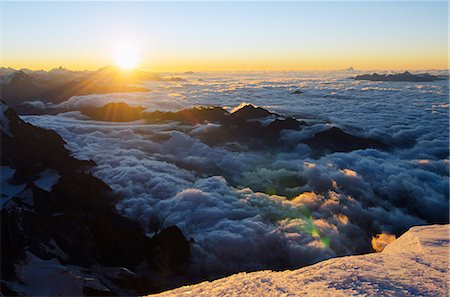 sunrise and above clouds - Sunrise from summit of Mont Blanc, 4810m, Haute-Savoie, French Alps, France, Europe Stock Photo - Rights-Managed, Code: 841-07082137